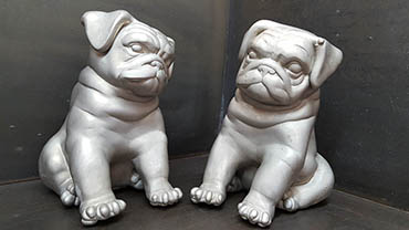 Two nickel electroformed bulldogs